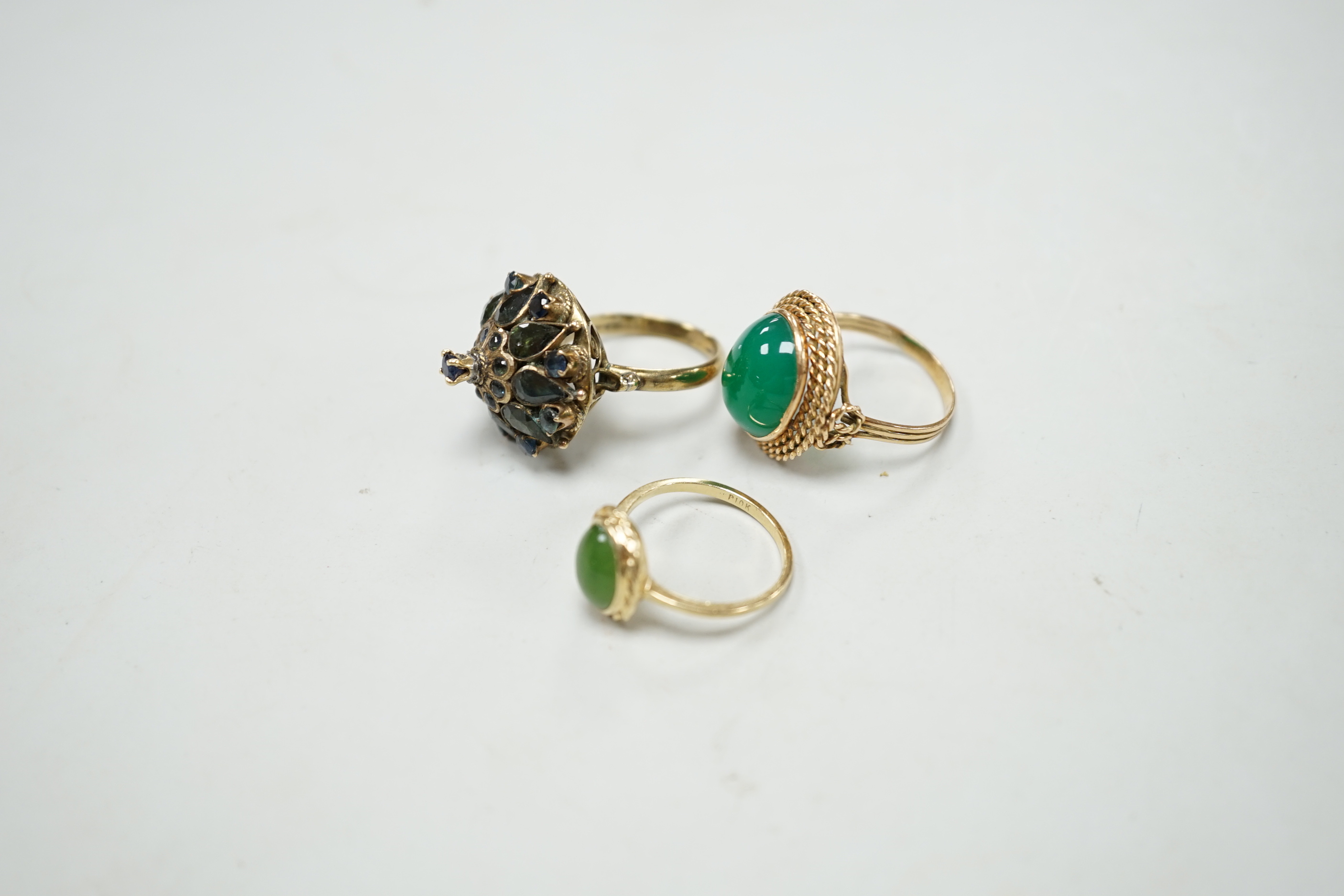 Three assorted yellow metal and gem set dress rings, including 14k and 10k, gross weight 13.2 grams.